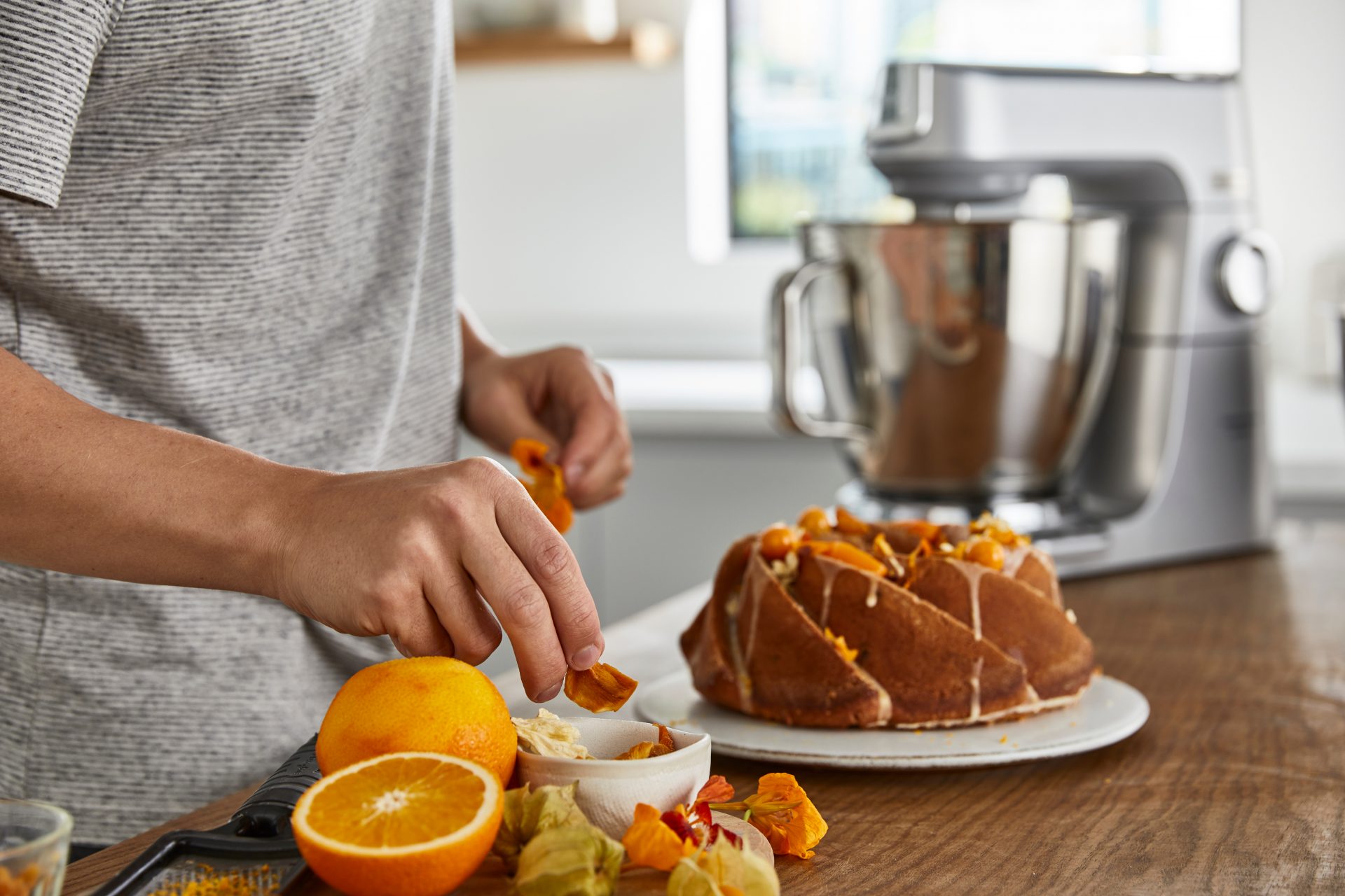 Kenwood Titanium Chef Baker XL with a citrus bundt cake in the foregroung